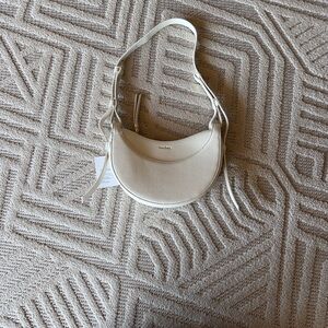 White Leather crescent shaped Shoulder Bag